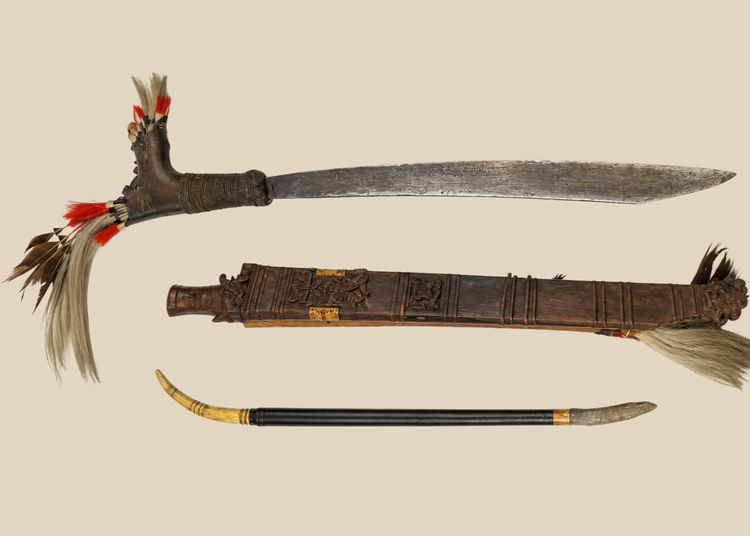 Antique Dayak Mandau sword with carved scabbard and pisau raut utility knife