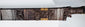 Detail of Mandau scabbard showing openwork ornament and contrasting applied elements