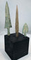 Long narrow lanceolate bronze arrowhead with brown mineral patination