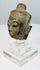 Theravada Buddhist bronze head from Thailand or Burma with natural patina and ritual wear