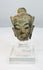 Southeast Asian bronze Buddha fragment with meditative features, aged patina, and lacquer traces