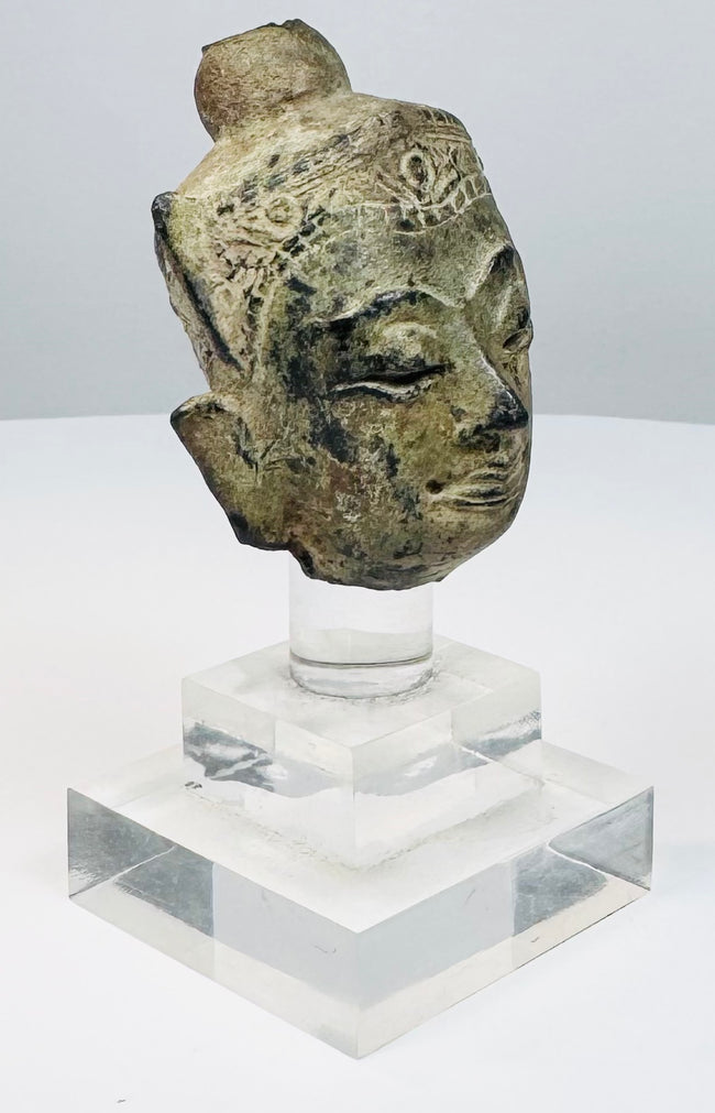 Antique Thai or Burmese Buddha head mounted on acrylic stand with centuries-old bronze patina