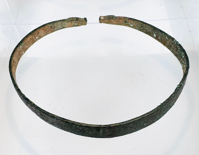 Ancient Iranian Plateau copper-alloy bracelet with stylized zoomorphic finials