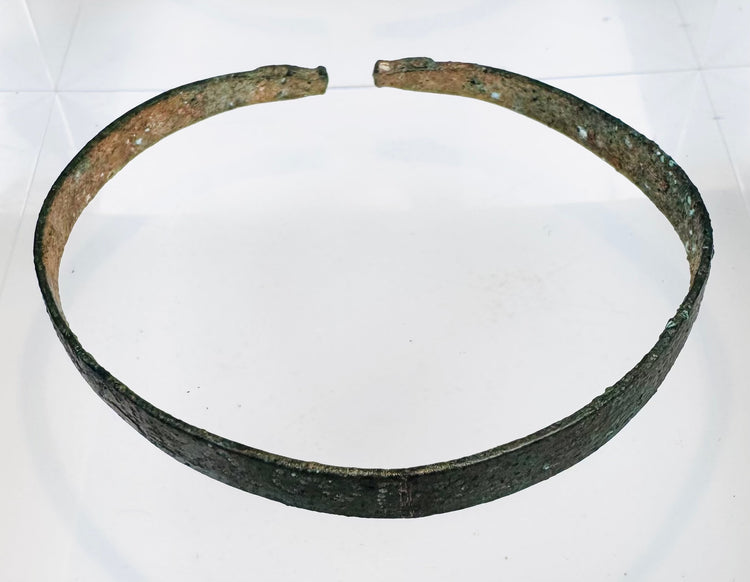 Ancient Iranian Plateau copper-alloy bracelet with stylized zoomorphic finials