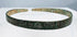 First-millennium BCE bronze bracelet with incised geometric decoration and green patina