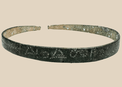 Ancient Western Asiatic bronze bracelet with open penannular form and animal-head terminals