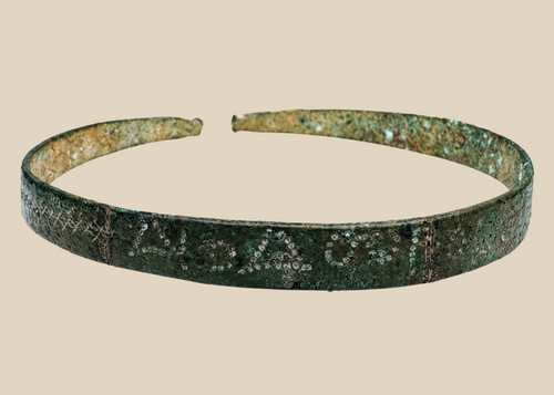 Ancient Western Asiatic bronze bracelet with open penannular form and animal-head terminals