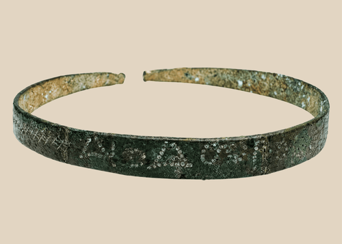 Ancient Western Asiatic bronze bracelet with open penannular form and animal-head terminals
