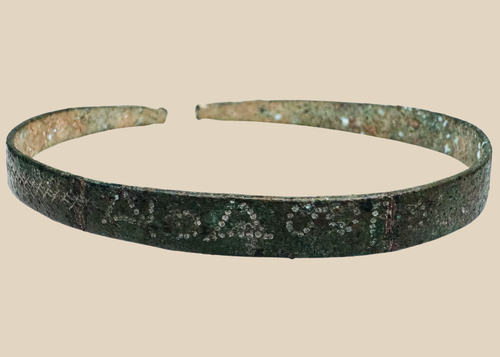 Ancient Western Asiatic bronze bracelet with open penannular form and animal-head terminals