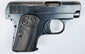 Belgian Browning Model 1906 featuring an oval ejection port, curved trigger, and age-worn checkered grip panel.