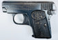 Early 20th-century FN Browning Model 1906 with silvered finish wear, slide serrations, and an FN grip monogram.