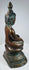Rear three-quarter view of the Konbaung Buddha with green verdigris patina