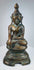 Front view of a Burmese seated Buddha in the earth-touching gesture