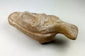 Ancient Byzantine terracotta lamp with worn patina and facial design