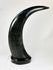 Mid-20th-century East Asian decorative horn sculptures with dragons, tigers, clouds, and black lacquered mounts