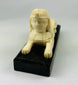 Egyptomania sphinx sculpture with pharaonic head and lion body, early to mid 20th century