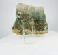 Ancient Mediterranean limestone fragment with weathered surface and centuries-old patina