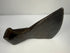 Colonial-era iron axe head with heavy wedge-shaped form and rich historic patina