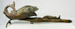 Cameroonian bronze fish pipe with curved tail and detailed scale texture
