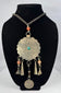 Mid-20th-century Kuchi-style necklace with scalloped metal pendant and interlinked chain