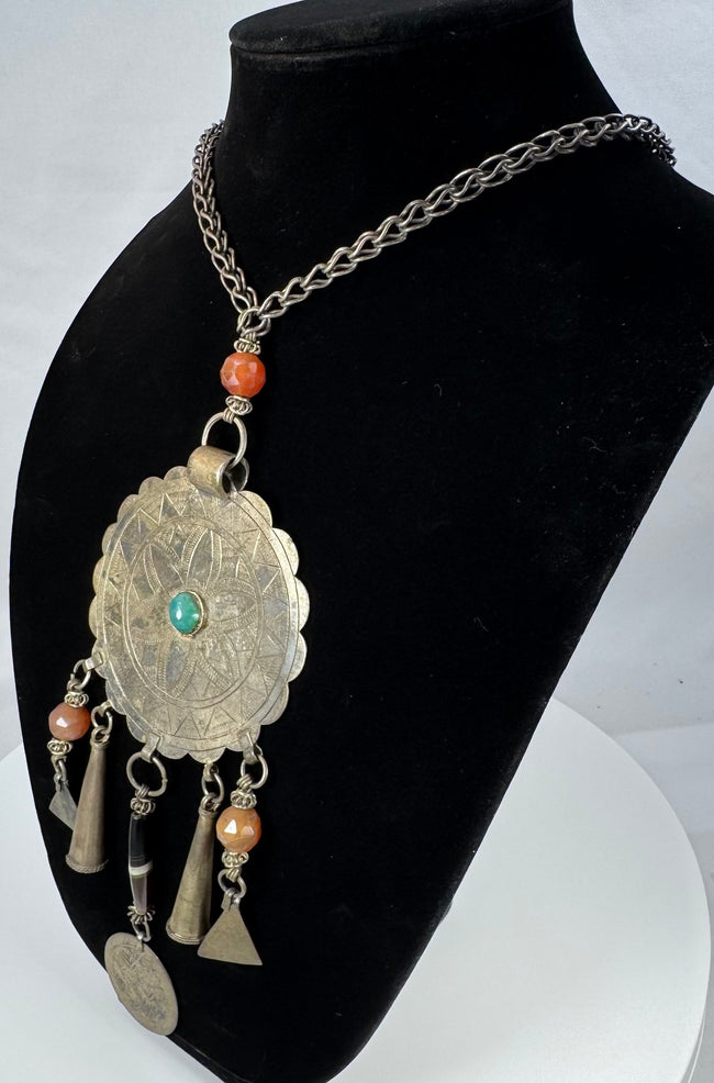 Kuchi-style ceremonial necklace with banded bead and Arabic or Persian-script coin