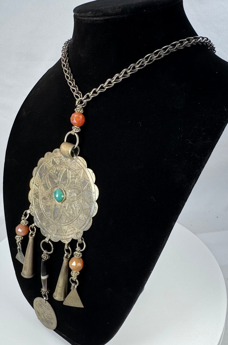 Kuchi-style ceremonial necklace with banded bead and Arabic or Persian-script coin