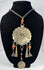 Central Asian tribal jewellery with engraved rosette pendant and suspended metal ornaments