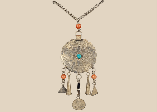Tribal Afghan necklace with engraved circular pendant, turquoise-coloured cabochon, beads, and coin drop