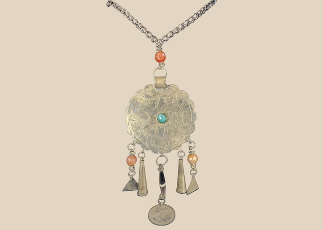 Tribal Afghan necklace with engraved circular pendant, turquoise-coloured cabochon, beads, and coin drop