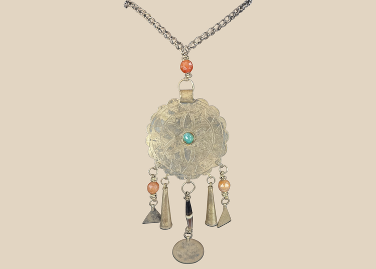 Tribal Afghan necklace with engraved circular pendant, turquoise-coloured cabochon, beads, and coin drop