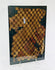 Ancient Chancay textile fragment with natural-dyed checkerboard cotton weaving from coastal Peru.