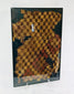 Ancient Chancay textile fragment with natural-dyed checkerboard cotton weaving from coastal Peru.