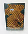 Close-up of Pre-Columbian Chancay textile showing fine cotton fibers and symbolic patterning.