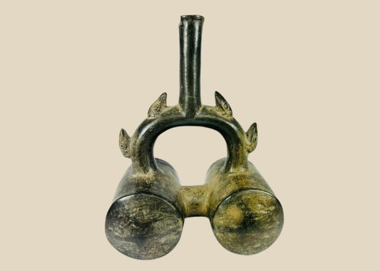 Authentic Pre-Columbian Chimu greyware stirrup vessel, circa 900–1470 CE, featuring double chambers, sculpted spouts, and dark burnished surface.