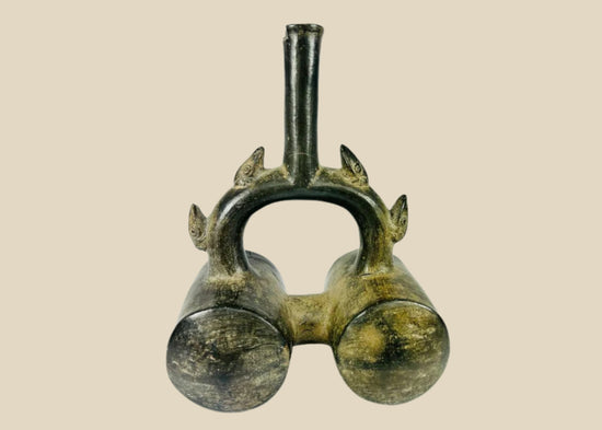 Authentic Pre-Columbian Chimu greyware stirrup vessel, circa 900–1470 CE, featuring double chambers, sculpted spouts, and dark burnished surface.