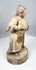 Chinese carved wood official wearing a broad-sleeved ceremonial robe