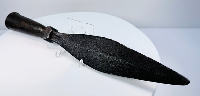 Close view of antique Chinese spearhead showing forged iron blade, stopper and socket construction