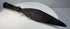 Side view of antique Qing Dynasty spearhead showing broad iron blade and tapered socket
