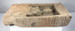 Early Chinese Buddhist temple brick with seated Buddha relief and naturally weathered archaeological surface