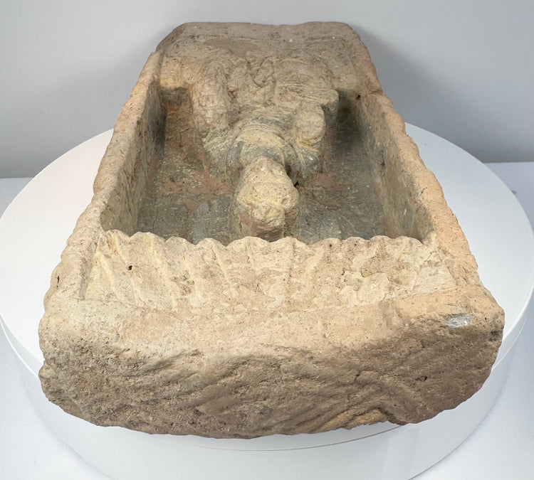 Ancient Chinese terracotta Buddhist relief with haloed Buddha figure, layered robes and sacred shrine imagery