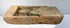 Ancient Northern Wei terracotta brick showing thickness, rough architectural edges and recessed Buddha carving