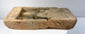 Ancient Northern Wei terracotta brick showing thickness, rough architectural edges and recessed Buddha carving