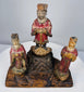 Hand-carved Chinese shrine ensemble displaying layered architectural construction and ritual symbolism