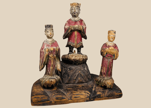 Antique Chinese polychrome wooden shrine group with a central official and two smaller attendants