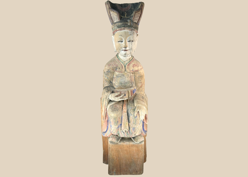 Chinese carved wooden sculpture of a seated court official with original polychrome decoration.