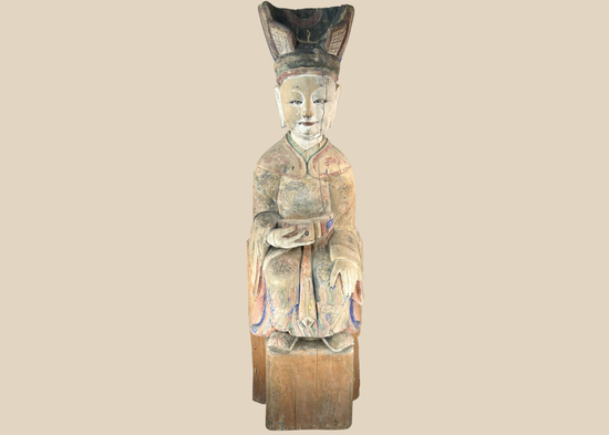 Chinese carved wooden sculpture of a seated court official with original polychrome decoration.