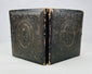 19th-century embossed leather ambrotype case with floral and oval medallion design