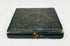 Civil War–era black leather photographic case with gold clasp, closed view
