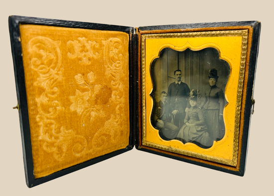 Civil War–era ambrotype of a Boston family displayed in an open velvet-lined leather case