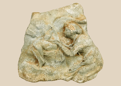 Ancient carved limestone relief fragment from the Mediterranean or Near East, Classical Period (circa 500 BCE–500 CE). Features two expressive human figures, likely part of a larger mythological or commemorative scene. Weathered surface and patina reflect centuries of age and Classical artistic traditions.
